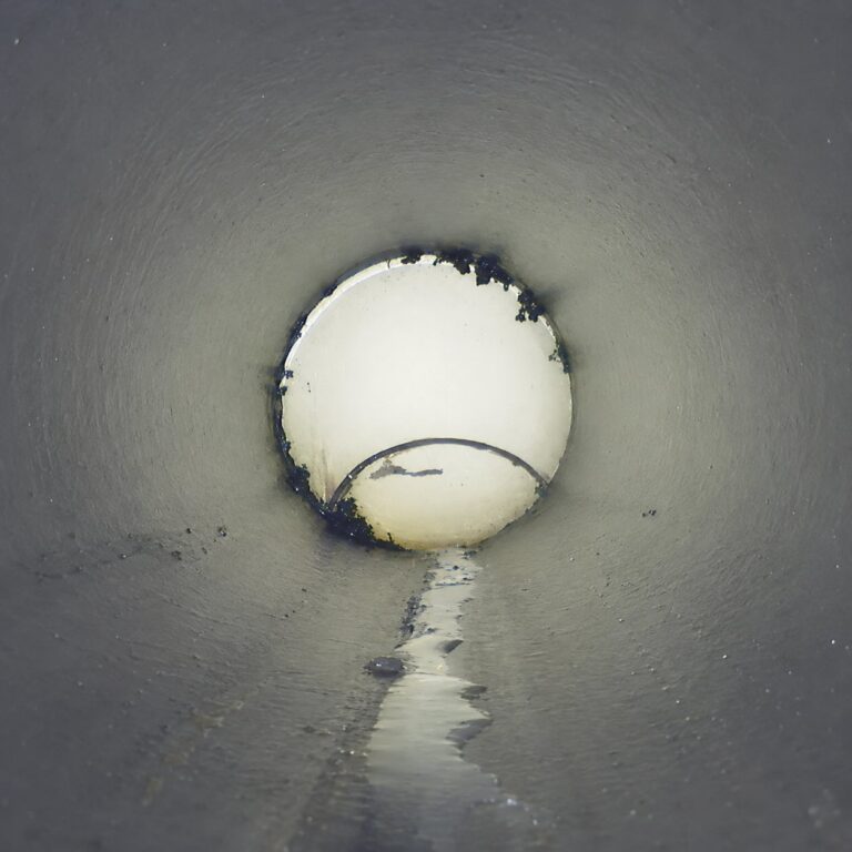Smooth cured in place pipe liner after curing, with the branch connection reinstated