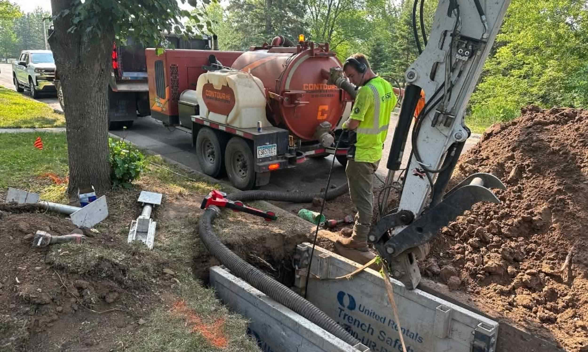 Water and sewer main line connection