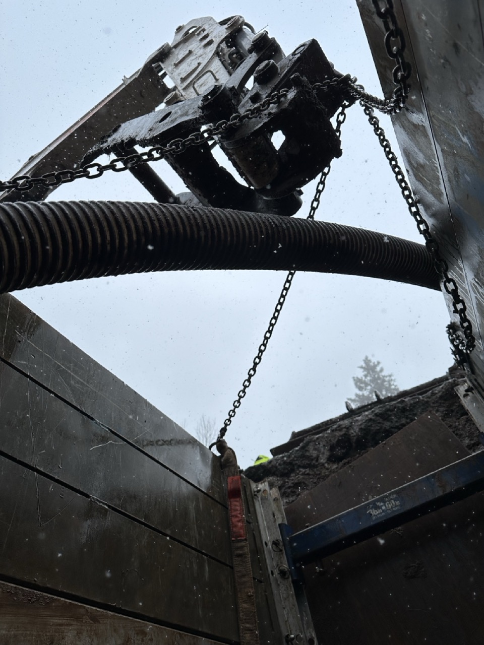 Contour crew working on a trenchless pipe bursting project in Duluth MN
