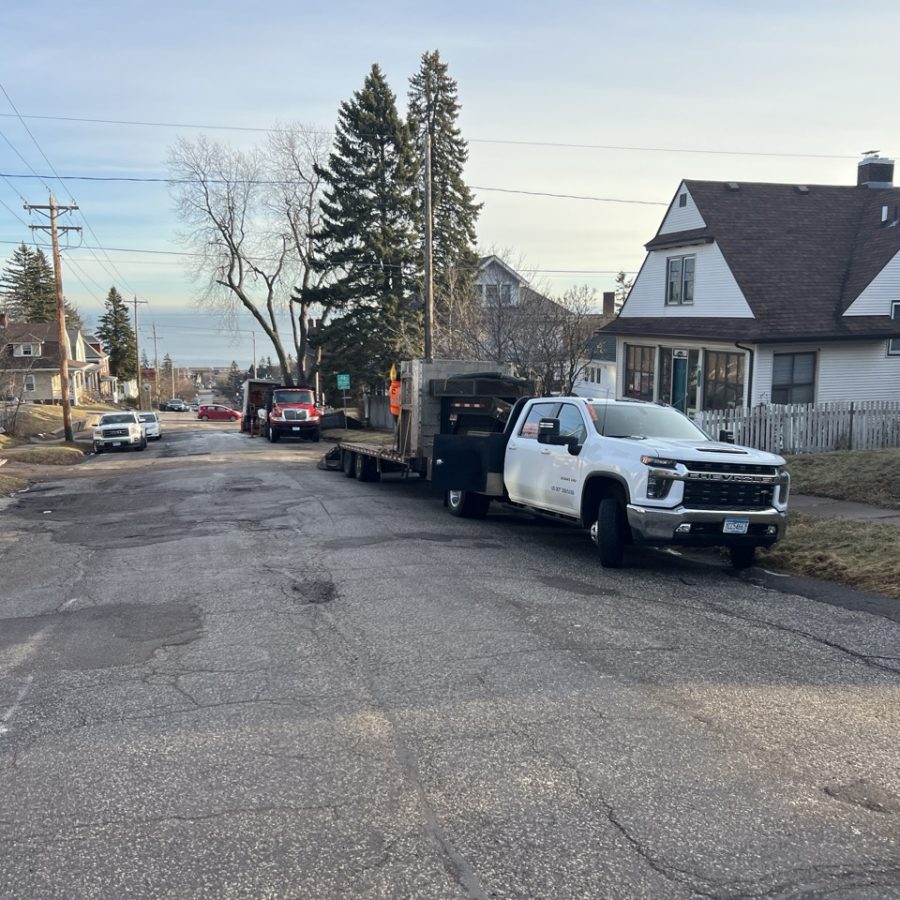 Contour Inc. site preparation vehicles on an urban Duluth job site
